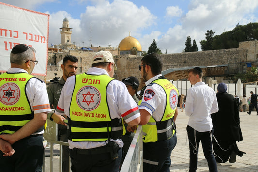 a group of men standing next to each other
