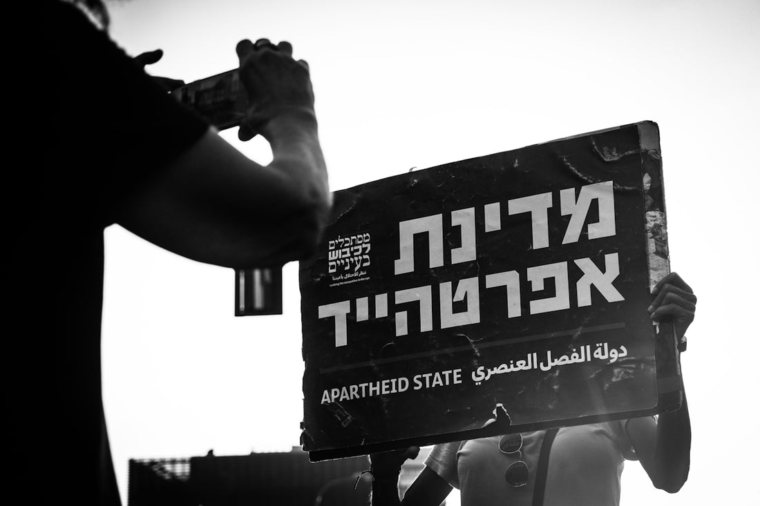 a person holding a sign